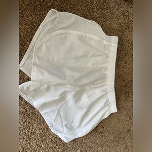 3 pairs of Nike tempo running shorts, size medium, black and white women